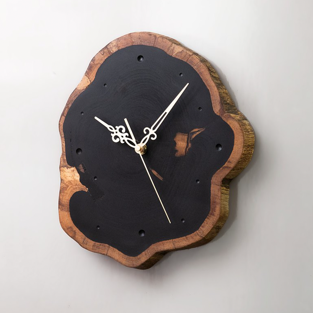 Appreciating wood | Ebony log silent wall clock